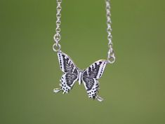 beautiful and delicate butterfly pendant. Each butterfly is handcrafted in Sterling silver .960 and might be a little different from one another. The pendant comes on a sterling silver oxidize necklace. size: width: 2.2 cm height: 18mm Thank you for looking :) Silver Butterfly Necklace With Butterfly Clasp, Sterling Silver Jewelry With Butterfly Clasp, Sterling Silver Necklace With Butterfly Clasp For Gift, Silver Sterling Silver Jewelry With Butterfly Clasp, Tiny Butterfly Sterling Silver Jewelry, Tiny Sterling Silver Butterfly Jewelry, Silver Sterling Butterfly Necklace, Silver Sterling Butterfly Necklace With Butterfly Clasp, Silver Engraved Butterfly Jewelry