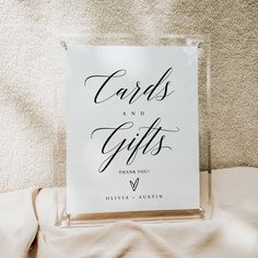 a sign that says cards and gifts on it