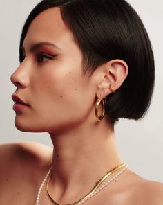 Lucy Williams Entwine Hoop Earrings 18ct Gold Plated. Your Ear Stack, Upgraded. These Lucy Williams X Missoma Best Sellers are Are Everything We Love about Vintage-Inspired Hoops, Featuring a Unique Crossover Design. Pair with an Ear Cuff for Retro Styling. Metal: 18Ct Gold Plated on Brass Dimensions: 35mm Hoops; Width 6mm Weight: 27. 5g Pair Product Code: Lws-G-E4-Ns Classic Teardrop Single Hoop Earring, Refined Gold Jewelry With Matching Earrings, Refined Gold Drop Earrings, Classic Gold Wrap Earrings For Pierced Ears, Teardrop Tarnish Resistant Hoop Earrings For Wedding, Classic Gold Wrap Earrings, Everyday Luxury Gold Hoop Huggie Earrings, Teardrop Hoop Earrings For Wedding, Tarnish Resistant, Elegant Huggie Hoop Earrings With Polished Finish