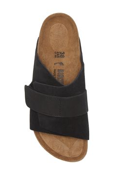 A signature cork footbed ensures anatomical comfort in an easygoing sandal fitted with a wide suede strap that feels secure on the foot. Adjustable hook-and-loop strap Leather upper and lining/rubber sole Made in Germany Flats With Arch Support, Slide Sandals, Slip On Sandal, Birkenstock, Kyoto, Soft Leather, Womens Sandals, Leather Straps, Leather Upper