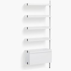 a white shelf with three shelves and two drawers on each side, in front of a white wall