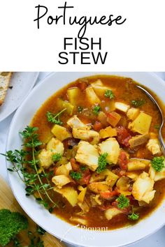 the recipe for portuguese fish stew is shown in a bowl with bread and parsley