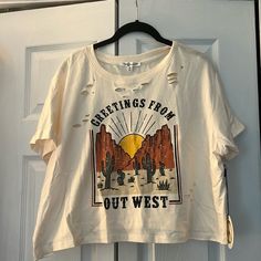 Brand New With Tags Cream Colored Greetings From Out West T Shirt Casual Distressed Short Sleeve Tops, Distressed Graphic Tee With Crew Neck, Out West, Lazy Days, Love Peace, Crop Tshirt, Tshirt Colors, Peace And Love, Womens Sizes