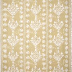 a beige and white rug with snowflakes on it