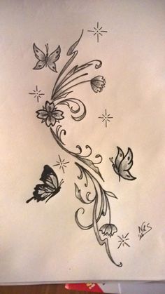 a piece of paper with some butterflies on it and stars in the sky behind it