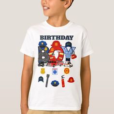 a young boy wearing a birthday t - shirt