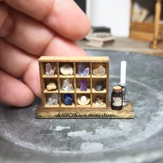 a miniature box with some rocks in it