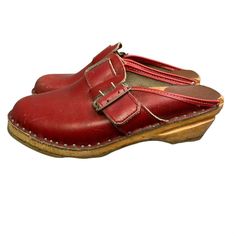 Vintage Bastad Toffeln red leather clogs. Size 36 which is equal to a US size 6 or 6-1/2. Good condition except for distressing to wood at front of each shoe (see photos). Not coming apart but the damages are there. Condition: Pre-Owned Good Vintage Leather Clogs With Leather Footbed, Red Slip-on Mules With Leather Footbed, Vintage Clogs With Leather Sole And Closed Toe, Vintage Leather Footbed Clogs With Closed Toe, Vintage Closed Toe Clogs With Leather Sole, Red Clogs With Leather Footbed And Round Toe, Vintage Leather Footbed Closed Toe Clogs, Vintage Leather Sole Closed Toe Clogs, Vintage Clogs With Rubber Sole And Round Toe