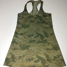 Lululemon Woman's Sleeveless Pull-On Strait Hem Camouflage Print Tank Top Green Color. Size M Country Manufactured Unknown. New Without Tag, In Excellent Condition. Good For Many Occasions And Seasons. Fast Shipment. Chest 28 In, Length 28 In. Fitted Camouflage Sleeveless Top, Fitted Sleeveless Camouflage Top, Casual Camouflage Sleeveless Top, Print Tank Top, Camouflage Print, Lululemon Women, Print Tank, Printed Tank Tops, Green Color