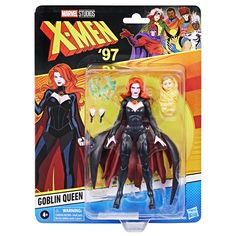 an action figure from the x - men series is shown in its packaging, with red hair