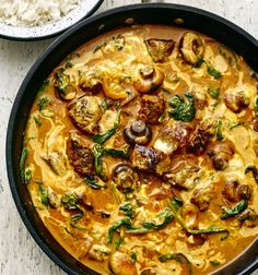 a pan filled with food sitting on top of a table