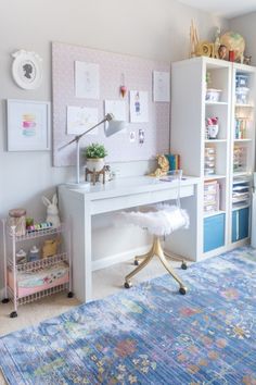 a bedroom with a bed, desk and shelves