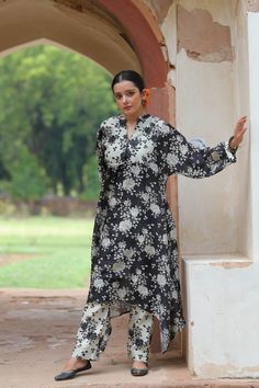 An anti-fit kurta featuring digital print crafted out of soft Chanderi silk. It is paired with narrow pants and comes as a set of 2. Fabric : Chanderi Colour : Black & white Embroidery details : Hand embroidery No.of components : 2 Delivery time : 15-20 days Washing Instructions : DRY CLEAN ONLY Designer Silk Kurta With Printed Motifs, Silk Straight Kurta With Printed Motifs, Designer Silk Kurta With Digital Print, Traditional Tunic Kurta With Digital Print, Traditional Digital Print Tunic Kurta, Silk Straight Kurta With Digital Print, Silk Anarkali Tunic Sets, Eid Tunic Kurta With Digital Print, Festive Silk Kurta With Digital Print