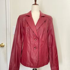 Beautiful Women’s Genuine Leather Lamskin Excellent Quality Coat. Size M. New Without Tags. Never Worn. Button Closure. Two Pockets On The Front. Great For Fall And Winter. Approximate Measurements Flat Across: - Shoulders (Farthest Point): 13 Inches - Bust: 15 Inches - Waist: 12 Inches - Hips: 15.5 Inches - Length: 48 Inches - Sleeve Length: 26 Inches Feel Free To Ask For More Details. Smoke And Pet Free Home. Offers And Bundles Are Welcome. T. Red Leather Jacket With Button Closure For Work, Classic Red Leather Jacket With Button Closure, Classic Red Leather Jacket For Work, Fall And Winter, Leather Coat, Genuine Leather, Jackets & Coats, Jackets For Women, Leather Jacket