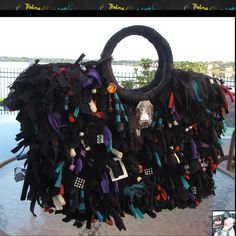 "Black Fringe Purse,short fringe Bag,Rhinestones,Jewels,Beaded bag,upcycled,funky handbag,one of a kind,custom made Bursting with Color. These handmade unique one of a kind upcycled fabric fringe Handbag/Bags/Purse/Totes are handmade by re-purposing strips of fabric, so no two Bags will ever be the same. Because of the nature of how they are made if you are ordering a solid color Bag, the colors will not all be the same shade but will be very close. When ordering a custom multi colored upcycled Fringe Handbags Purses, Funky Handbags, Diy Denim Skirt, Funky Purses, Fringe Handbags, Custom Handbags, Fringe Purse, Short Fringe, Perfect Handbag