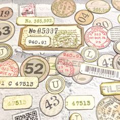 many different types of stamps and numbers on a piece of paper