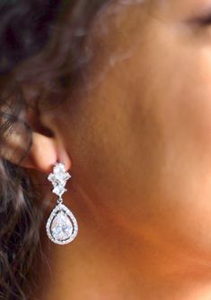 A stunning pair of marquise cut pear shape teardrop earrings that will look gorgeous with your wedding dress. The cz stones are suspended from a cluster of marquise crystals at the top. You will love these earrings and can wear them even after your wedding day for special occasions. - High quality cubic zirconia crystals- Measures 1.25" in length- Hypo-allergenic nickel-free & lead-free - Finished with post earring back (perfect for sensitive ears)- Your jewelry will arrive beautifully packaged Teardrop Bridal Earrings, Marquise Cut, Sensitive Ears, Cz Stone, Real Diamonds, Earring Backs, Bridal Earrings, Pear Shape, Teardrop Earrings