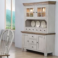 a white dining room set with china cabinet and chairs