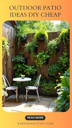 an outdoor patio with potted plants on the wall and two white chairs in front