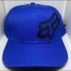 Cap With Fox Logo Adjustable Blue Flat Bill Baseball Cap For Spring, Blue Snapback Hat With Curved Bill For Spring, Blue Snapback Visor Hat For Spring, Blue Visor Snapback Hat For Spring, Blue Curved Bill Snapback Hat For Spring, Blue Visor Snapback Hat, Blue Baseball Cap For Spring Sports, Blue Spring Baseball Cap For Sports, Blue Snapback Hat For Spring Streetwear