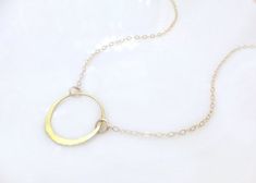 "Minimalist Eternity Necklace - 100% Sterling Silver, Rose Gold Fill or 14k Gold Fill A great gift for yourself or someone you love - Eternity circle is sterling silver, 14k gold fill or rose gold fill (Measures 17mm) - Dainty chain is available in 14k gold fill, rose gold fill or sterling silver - Necklace length includes circle and is shown at 18\" - Choose your favorite length - Necklace closes with a sterling silver, 14k gold fill, or rose gold fill spring clasp - Necklace is handcrafted, ma Minimalist Hoop Jewelry As Gift, Minimalist Hoop Jewelry Gift, Dainty Gold Hoop Necklace, Dainty Hoop Necklaces As Gift, Minimalist Hoop Jewelry With Adjustable Chain, Minimalist Gold Hoop Necklace, Minimalist Hoop Jewelry With Delicate Chain, 14k Gold Hoop Necklaces For Gifts, Simple Design Hoop Jewelry For Gifts