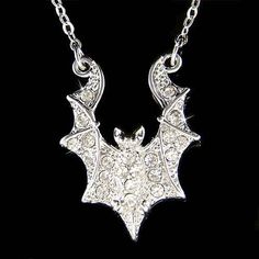 "PERFECT CHRISTMAS GIFT FOR LADIES This is a Brand New, stunning Bat Pendant with Swarovski crystals. It comes with a FREE 16\" with a 2\" extension chain (42cm -47cm) rhodium finish necklace with lobster clasp. Pendant Size: 3/4\" wide X 1\" high (19mm X 25mm) Crystal Color: Crystal Clear Prices are in US$. For shipping policies and other important information, click on \"profile\" on the right. See an item that you like but has already been sold? Contact me to see if I have more! Thank you for Punk Halloween Costume, Thushi Necklace, Rocker Jewelry, Silver Chain Anklet, Punk Halloween, Bat Pendant, Bible Verse Necklace, Goth Accessories, Faith Necklace