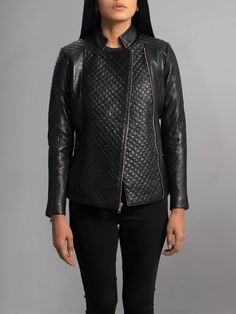 Elevate your outerwear game with the Orient Grain Quilted Black Leather Biker Jacket. Crafted to perfection, this jacket seamlessly blends style and functionality, making it a standout piece in any wardrobe. Crafted from premium quality leather, this jacket boasts a rich black hue that exudes timeless sophistication. The orient grain texture adds depth and character to the jacket, giving it a luxurious feel and a unique look that sets it apart from the rest. The standout feature of this jacket is its quilted detailing, which adds a touch of classic charm to the modern biker silhouette. The intricate stitching not only enhances the jacket's aesthetic appeal but also provides extra warmth and comfort, making it the perfect choice for cooler weather. Whether you're hitting the open road on yo Luxury Black Quilted Jacket, Modern Biker Jacket With Padded Collar For Fall, Fitted Quilted Biker Outerwear, Black Quilted Biker Outerwear, Black Quilted Biker Jacket For Fall, Quilted Leather Jacket For Workwear, Quilted Long Sleeve Leather Jacket For Work, Black Leather Jacket With Zipper For Work, Black Leather Jacket With Padded Collar For Work