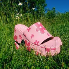 Transform your look with the Pink Haze Platform Sandals and step into a world of retro charm and modern comfort. Featuring a vibrant pink floral print, these open-toe sandals are perfect for channeling 70's vibes while the chunky, cushioned design keeps you comfortable and stylish all day long. Retro Floral Print: Eye-catching pink floral pattern for a fun, vintage-inspired look. Open-Toe Design: Perfect for showcasing your pedicure and keeping cool. Chunky Platform: Adds height while providing Jesus Sandals, Barbie Shoes, Cinderella Shoes, Personalized Shoes, Pink Floral Pattern, Pink Floral Print, Platform Sandals Heels, Chunky Platform, Open Toe Sandals