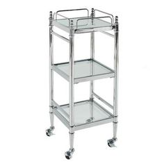 a three tiered metal cart with wheels and glass shelves on the bottom shelf,