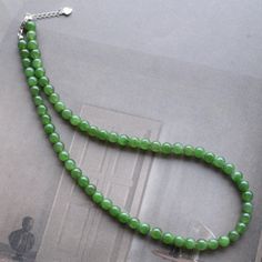 Natural Vivid Green Jade Bead Necklace|High Quality Jade|Everyday Minimalist Necklace|Anniversary Gift|Perfect Gift For Her|6mm Beads 💚💚 Specifics: Materials: Natural green nephrite jade and magnetic stone spacer, jade is from Canada, vivid green color with high quality. Necklace size: 16 -- 26 Inches Bead diameter:6.0mm Handmade Artwork, original design and copyright protected, it is my original design and creation, copy right protected, any similar items found on Etsy would be considered as Jade Bead Necklace, Nephrite Jade, Natural High, Jade Necklace, Jade Bracelet, Handmade Artwork, Jade Jewelry, Necklace Size, Jade Beads