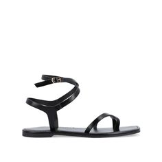 The Charra sandal from Journee, features an open-toe design and a secure buckle closure for a stylish and adjustable fit. Crafted from durable faux leather, this sandal boasts a comfortable flat sole. • Open-Toe • Sandal • Buckle • 4 mm Tru Comfort Foam™ Insole • Flat Sole • Faux Leather All measurements are approximate and were taken using a size 6. Please note measurements may vary slightly by size. Ankle Wrap, Comfortable Flats, Open Toe Sandals, Journee Collection, Black 7, Toe Designs, Strap Sandals, Flat Sandals, Open Toe