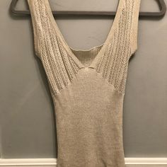 Feminine And Delicate. Great For Holidays. A Little Shimmer But Not Too Much. Very Flattering. Great Used Condition. Offers Always Welcome!! Beige Fitted V-neck Tank Top, V Neck Tops, Too Much, Metallic Silver, Dolce And Gabbana, Womens Tops, Holidays, V Neck, Silver