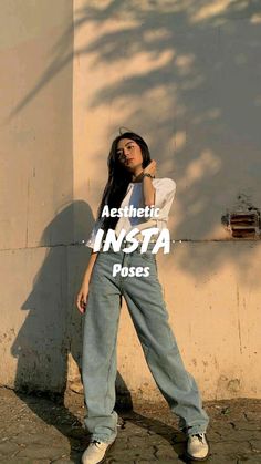 a woman standing in front of a wall with her hand on her hip and the words aesthetic insta poses