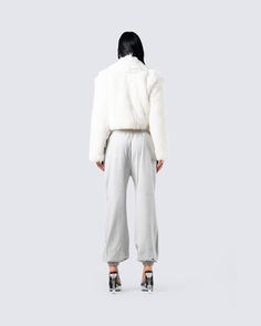 When the fit is not only comfy, but a major slay 😮‍💨​ Turn your off days into a little more with this ivory faux fur coat, white jersey cropped tank, and grey sweatpant set 🙌🏼 Fur Coat White, Fuzzy Skirt, White Corset Dress, Denim Pleated Skirt, Parachute Pant, Chain Dress, Red Mini Skirt, Orange Satin, Coat White