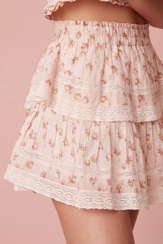 Our best selling Ruffle Mini Skirt returns for the season with a dainty floral printed cotton voile fabric. She features intricate inset lace trims and allover pintuck details. The elasticated waistband and double lining offers flexibility in comfort and styling. Tiered ruffles exude effortless femininity. The mini is finished with a frayed, raw hem for added playfulness. Early Spring Outfits Casual, Fancy Skirts, Spring Trends Outfits, Romantic Floral Print, Cotton Voile Fabric, Voile Fabric, Ruffle Mini Skirt, Early Spring Outfits, Princess Outfits