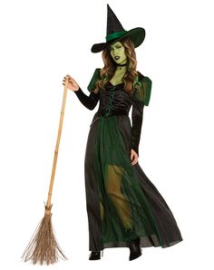 a woman in a witch costume holding a broom