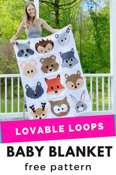 a woman holding up a baby blanket with the words lovable loops on it