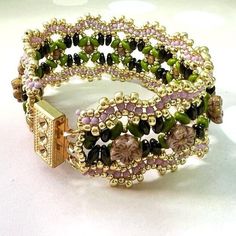 "Special and elegant pink, gold, and green bracelet. This unique bracelet is perfect for formal wear, casual wear, evening dress, or whatever you like. It is also perfect as a gift for yourself or someone you care about. The cuff bracelet is beaded with Czech and Miyuki beads. The closure is by a box clasp. ♦ 𝗔𝗱𝗱 𝘀𝗼𝗺𝗲 𝗺𝗼𝗱𝗲𝗿𝗻 𝗹𝗼𝗼𝗸 𝘁𝗼 𝘆𝗼𝘂𝗿 𝗼𝘂𝘁𝗳𝗶𝘁 𝘄𝗶𝘁𝗵 𝘁𝗵𝗶𝘀 𝗵𝗮𝗻𝗱𝗺𝗮𝗱𝗲 bracelet ♦ ♦ 𝗧𝗵𝗼𝘂𝗴𝗵𝘁𝗳𝘂𝗹𝗹𝘆 𝗽𝗮𝗰𝗸𝗮𝗴𝗲𝗱 𝗶𝗻 𝗮 𝗴𝗶𝗳𝘁 𝗯𝗼𝘅 ♦ ♦ 𝗠𝗘𝗔 Bracelet Elegant, Green Bracelet, Gold And Green, Box Clasp, Unique Bracelets, Miyuki Beads, Flower Bracelet, Handmade Bracelet, Bracelet Handmade