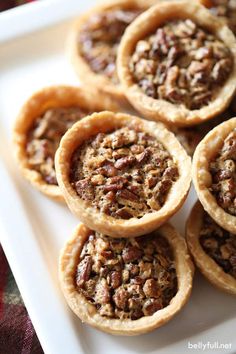 several pecan pies on a white plate