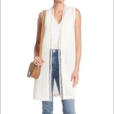 Nwot Cool Boho Hand Crocheted Duster Vest. Open Front - Sleeveless - Crochet Styling - Fringe Lower Hem - Belt Accent On Back - Split Accents On Back - Midweight Construction - Approx. 38" Length Chic Sleeveless Cardigan For Spring, Chic Sleeveless Spring Cardigan, White Spring Vest For Daywear, Chic White Sleeveless Cardigan, White Sleeveless Outerwear For Layering, Elegant Sleeveless Spring Cardigan, Styling Fringe, Duster Vest, Elie Tahari