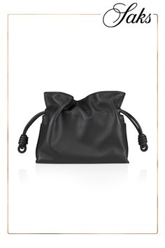 Launched in the 1970s, LOEWE's Flamenco clutch cinches closed using drawstring pulls finished with coiled knots. This piece is crafted of smooth leather with a signature stylized Anagram logo. Removable, adjustable shoulder strap Magnetic closure Leather Made in Spain SIZE 9.5W x 7H x 3.5D Loewe Flamenco Black, The 1970s, Holiday Gift Guide, Leather Clutch, Magnetic Closure, Handbag Accessories, Wallet Case, Smooth Leather, Apparel Accessories