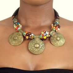 A statement necklace with multicoloured African beads and three large brass pendants. Small chevron beads add character to this piece. A brass filigree bead can also be found on each side of this necklace. A wonderful addition to any necklace collection. Chevron Beads, Brass Pendants, Brass Filigree, African Necklace, Necklace Collection, African Beads, Chain Styles, Favorite Jewelry, Statement Necklace