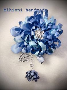 Blue And White Brooch Elegant Blue Brooch, Blue Brooch Lapel Pin As Gift, Elegant Blue Brooch Gift, Elegant Blue Brooch Pins, Elegant Blue Jeweled Brooches, Handmade Blue Wedding Brooches, Formal Blue Handmade Brooches, Blue Flower Lapel Pin For Gift, Blue Flower Brooch For Wedding