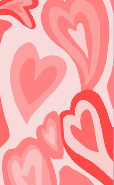 an abstract background with hearts in shades of pink and red