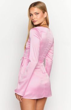 Pink Long Sleeve Satin Mini Dress 

 How to style: Our Lucy Pink Satin Mini is the perfect blend of elegance and playfulness! Made in a luxe satin material and a cut in a classic silhouette, this long sleeved mini () brings an air of effortless sophistication to any event. Style with strappy heels () and a shoulder bag () for date night, tying the look together with your favourite jewellery!

 Features: 

  
 * Mini length  
 * Square neckline  
 * Long unlined sleeves  
 * Invisible back zipper Adjustable Skirt, Prom Midi Dress, 60's Dress, Summer Playsuit, Satin Long Sleeve, Strapless Tops, Satin Mini Dress, Long Crop Top, Crop Top Sweater