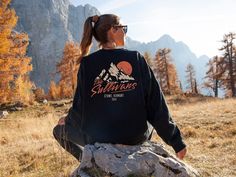 Get ready for your next family adventure with our matching mountain vacation sweatshirts - choose between a crewneck sweatshirt and a hoodie.  Customize your sweatshirts with your family name, trip location, and the year you're traveling. For example,  "The Sullivans, Stowe, VT, 2024" We use professional quality DGT printing on all our apparel. Direct-to-garment, or DTG, is a high quality printing method that sprays ink directly onto the garment so there is no peeling or cracking. Production Tim Fall Hiking Crew Neck Sweatshirt, Fall Hiking Sweatshirt Crew Neck, Fall Crew Neck Sweatshirt For Hiking, Winter Adventure Crew Neck Sweatshirt, Winter Crew Neck Sweatshirt For Adventure, Sporty Crew Neck Sweatshirt For Hiking, Crew Sweatshirt For Outdoor Activities In Fall, Casual Crew Neck Hiking Hoodie, Casual Crew Neck Hoodie For Hiking