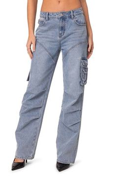 A faded wash adds unmistakable lived-in appeal to baggy nonstretch-denim jeans outfitted with adventure-ready cargo pockets and darts at the knees. Zip fly with button closure Front scoop pockets, coin pocket; back patch pockets; cargo flap-patch pockets 100% cotton Machine wash, dry flat Imported Mid-rise Washed Blue Cargo Jeans With Pockets, Washed Blue Mid-rise Cargo Jeans, Light Wash Casual Cargo Pants With Pockets, Baggy Light Wash Cargo Jeans With Pockets, Trendy Washed Blue Jeans With Cargo Pockets, Casual Light Wash Cargo Pants With Pockets, Baggy Light Wash Jeans With Multiple Pockets, High Rise Washed Blue Cargo Jeans With Multiple Pockets, Utility Washed Blue Mid-rise Cargo Jeans