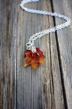 "Charming Fall Leaf Necklace, Maple Leaf Necklace, Autumn Necklace, Fall Necklace, Maple Leaf Jewelry, Autumn Leaf Jewelry, Fall Jewelry, Autumn Jewelry, Autumn Leaves, Fall Leaves, Holiday Jewelry by U'i Jewelry Just in time for fall fashion!! I created this charming and colorful necklace using red and yellow lucite maple leaves accented with Swarovski crystals that sparkle magnificently when they catch the light. The leaves are highly detailed, showing the actual veins of the leaf and are curv Sterling Silver Soldered Jewelry For Weddings, Amber Pendant Jewelry For Wedding, Handmade Amber Jewelry For Wedding, Amber Pendant Necklace For Wedding, Handmade Amber Necklaces For Wedding, Soldered Pendant Jewelry For Wedding, Leaf Necklace Silver, Maple Leaf Necklace, Autumn Necklace