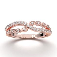 a rose gold ring with white diamonds