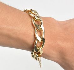 This stunning gold chain link bracelet can be worn to demonstrate a strong woman standing tall. Don't miss out. Plum Jewelry, Fashion Jewelry Editorial, Jewelry Editorial, Gold Chain Bracelet, Trendy Fashion Jewelry, Rings Jewelry Fashion, Fashion Jewelry Sets, Silver Jewelry Fashion, Gold Bracelet Chain